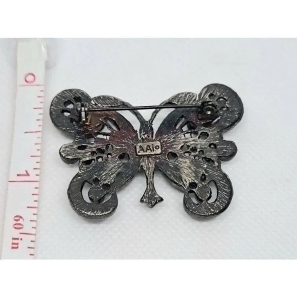 AAI butterfly brooch